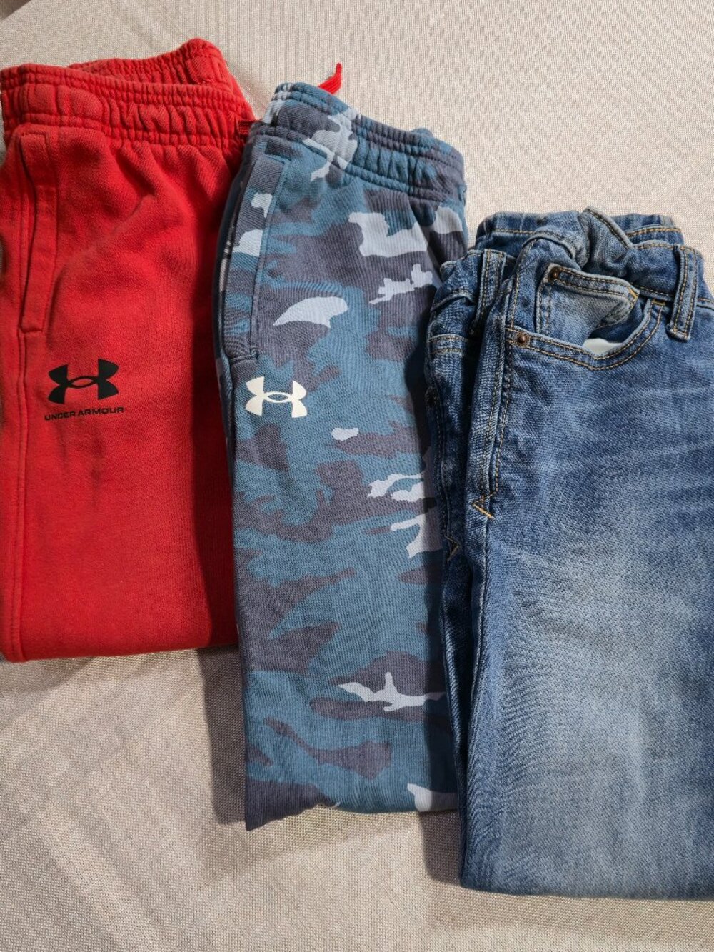 Lot of 3 Pair Boys Pants, 2 Pair Under Armour Sport Pants, 1 Pair Jeans